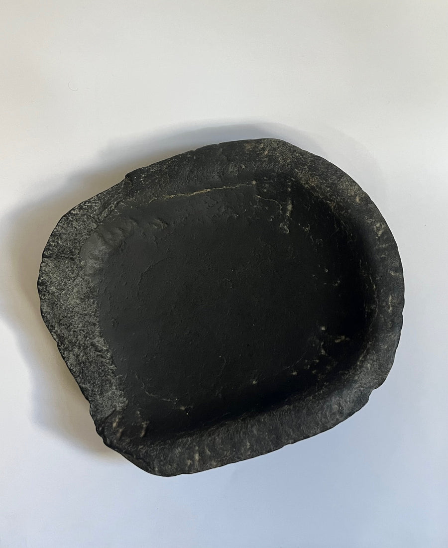 Antique black stone bowl