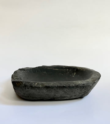 Antique black stone bowl