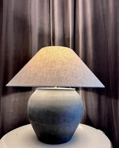 Oversized antique unglazed lamp