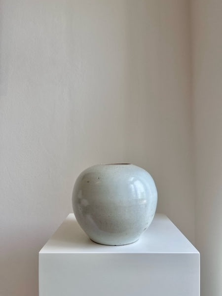 Antique white glazed ceramic vessel