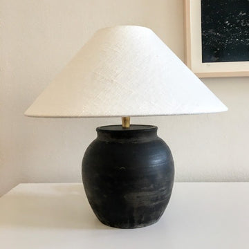 Small antique earthenware lamp